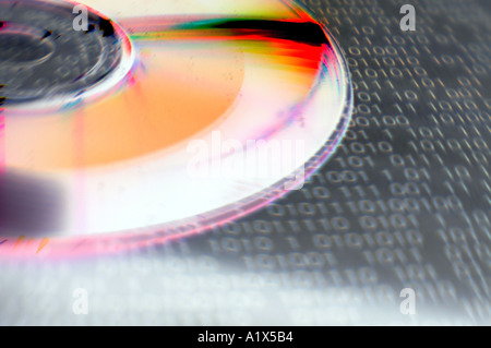 CD rom DVD computer disc with digital information and binary code Stock Photo