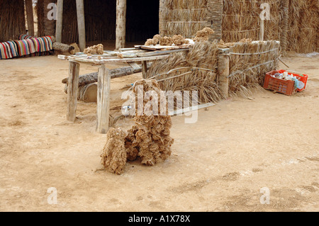 Souvenirs stall with desert roses on Sahara desert in Tunisia Stock Photo