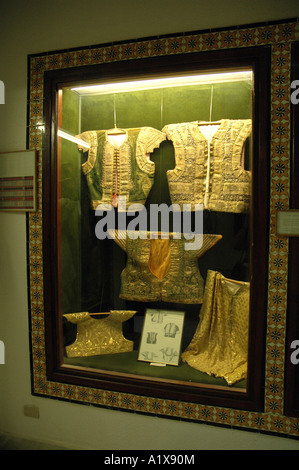 Tunisian traditional clothes in Dar Cherait Museum in Tozeur, Tunisia Stock Photo