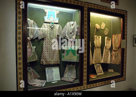 Tunisian traditional clothes in Dar Cherait Museum in Tozeur, Tunisia Stock Photo