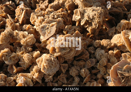 Souvenirs stall with desert roses on the roadside of causeway crossing Chott el Jerid lake in Tunisia Stock Photo