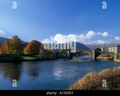 River Conwy and Pont Fawr arched stone bridge 1636 in autumn Llanrwst Conwy North Wales UK Stock Photo
