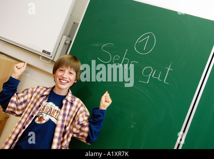 boy at the blackboard Stock Photo