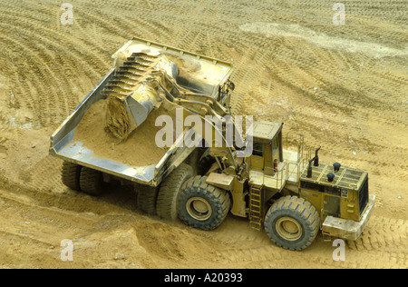 front end loader at work in iron ore mine Stock Photo