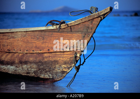 Local Fisherman s boat at sunset on the Indian Ocean Coast Bir Ali Stock Photo