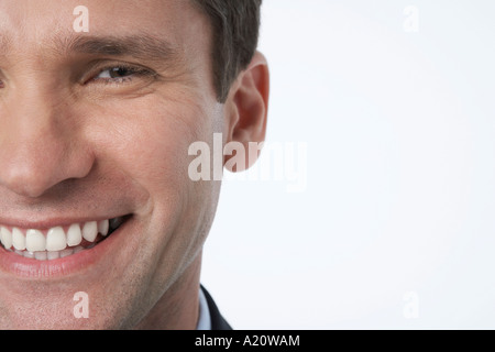 Smiling Businessman, cropped, close-up Stock Photo