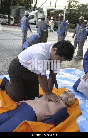 Emergency and first aid training for office employees, Tokyo, Japan. Stock Photo