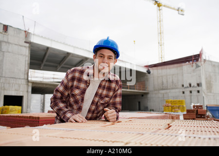 Young construction worker on building site Stock Photo
