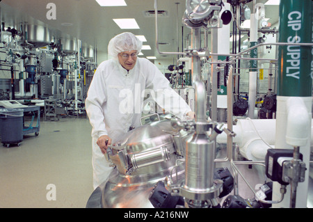 model released man technician working in bio engineering laboratory cleanroom Stock Photo
