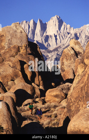 A couple hiking near Mount Whitney in the Alabama Hills in California