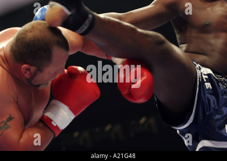 K-1 kick boxing fighters in the heat of a round, K1 tournament, Tokyo, Japan. Asia. Stock Photo