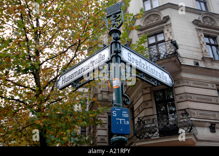 Street sign on the corner of Husemannstraße in East Berlin's Mitte district. Stock Photo