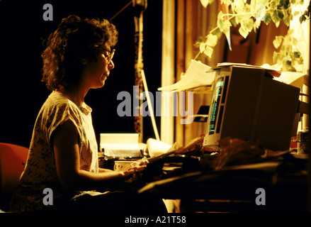A woman using a computer at home, London Stock Photo