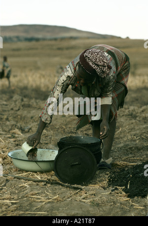 A woman prepares food, Lesotho, Southern  Africa Stock Photo