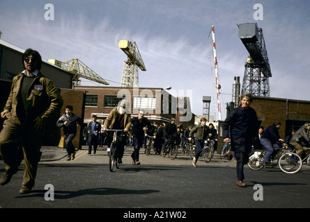 Workers leaving work at the end of the day at  Vickers Shipyard, Barrow-in-Furnace, UK Stock Photo