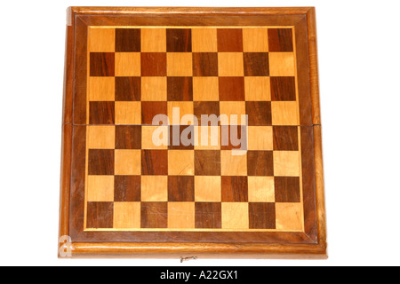 Old wooden chessboard from above Stock Photo