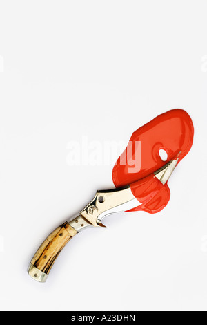 Knife with blood on white background