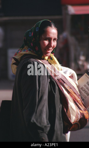 Demonstration against the war in Iraq in March 2003 in London homeless woman with a baby selling Big Issue Stock Photo