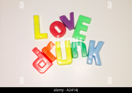 Love drunk written with fridge magnet letters. Stock Photo