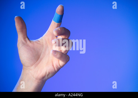 Blue plaster on finger Stock Photo, Royalty Free Image: 15293995 - Alamy