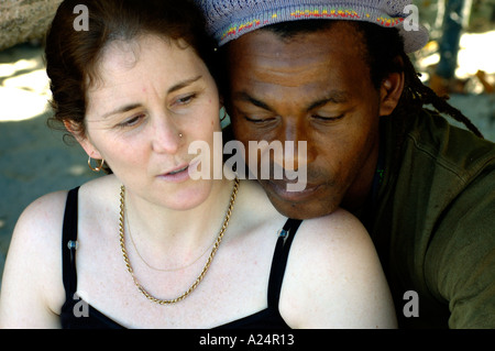 Portrait mixed race couple black male white female with faces together Stock Photo