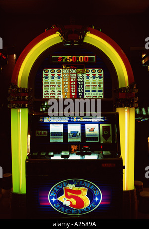 CLOSE UP OF A SLOT MACHINE WITH NEON LIGHTS Stock Photo