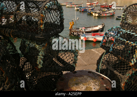 Lobster pots on harbour wall Hayle West Cornwall UK Stock Photo