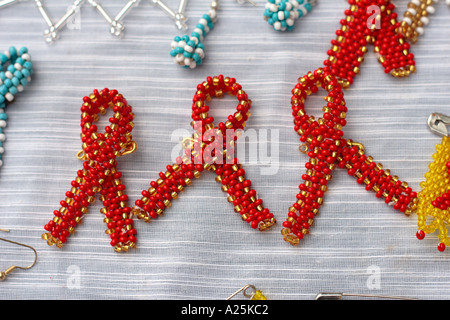 Bead beadwork HIV AIDS awareness badges in South Africa Stock Photo