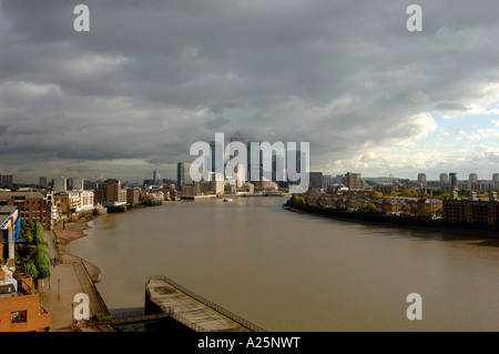 view looking down river thames towards canary wharf london england uk Stock Photo