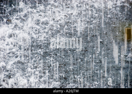 Splash. Rain drops falling on smooth surface of water Stock Photo - Alamy