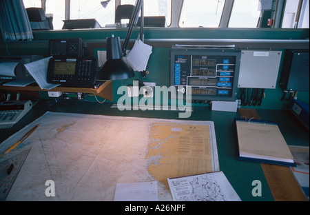 Navigation Desk on the Bridge of a Container Freigt Ship Stock Photo