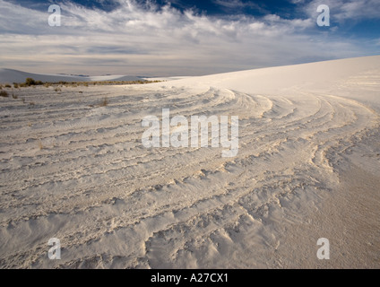 Beautiful wind sculpted white gypsum dunes in the White Sands National Monument Showing curved basal ridges Stock Photo