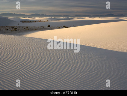 Beautiful wind sculpted white gypsum dunes in the White Sands National Monument Stock Photo
