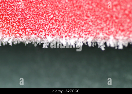 Morning frost on a red car window Stock Photo