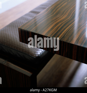 Corner edge of a polished wooden table Stock Photo