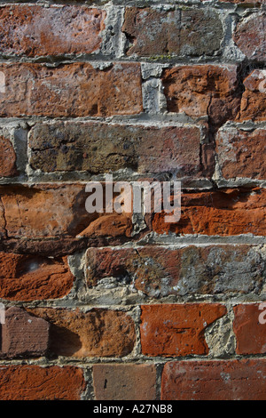 Brick wall in need of repair Stock Photo