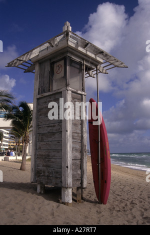 red surf leaned on a lifeguard tower on the beach of Fort Lauderdale Florida USA Stock Photo