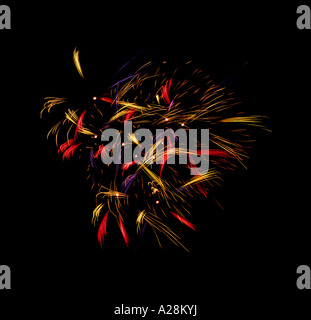 Chinese looking pattern of fireworks in red, purple and gold colours, set against a black sky. Stock Photo