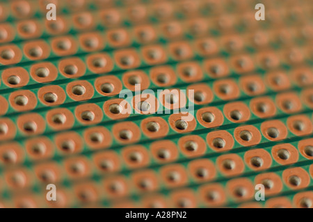detail close up of matrix or stripboard used for building prototype electronic circuit Stock Photo