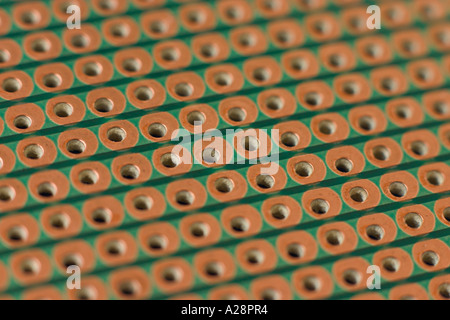 detail close up of matrix or stripboard used for building prototype electronic circuit Stock Photo