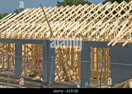 a timber framed home under construction Stock Photo