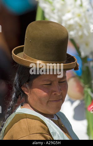 A local woman wearing a traditional 'bowler hat' in Copacabana, Bolivia. Stock Photo