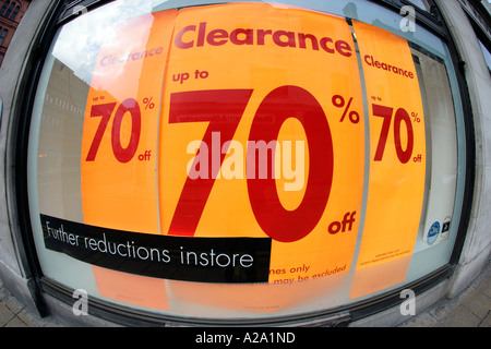 70 percent percentage off sale sign in a shop window retail sales slump Stock Photo