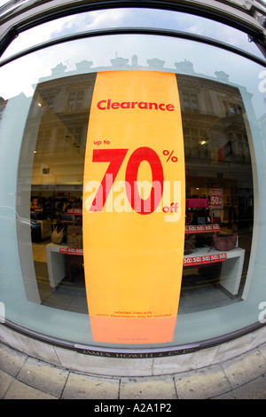 70 percent percentage off sale sign in a shop window Retail sales Stock Photo