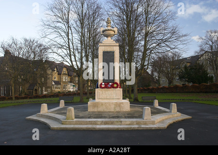 1st World War Memorial (names inscribed on brass plaque, poppy wreaths laid on Remembrance Day) - Memorial Gardens Ilkley, West Yorkshire, England UK. Stock Photo