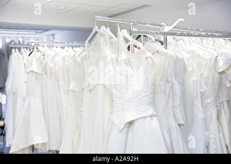 Wedding dresses on a clothes rail Stock Photo