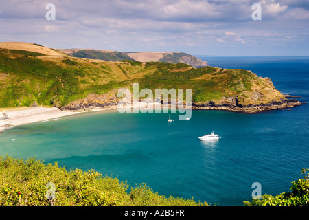 Sunny View of Lantic Bay and Pencarrow Head South Cornwall England UK Stock Photo