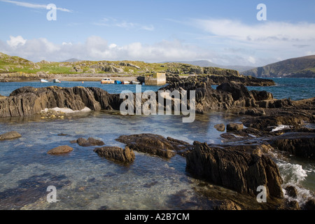 Rocks in small natural harbour in Garnish Bay on Ring of Beara tourist route Garnish Point Co Cork Eire Stock Photo