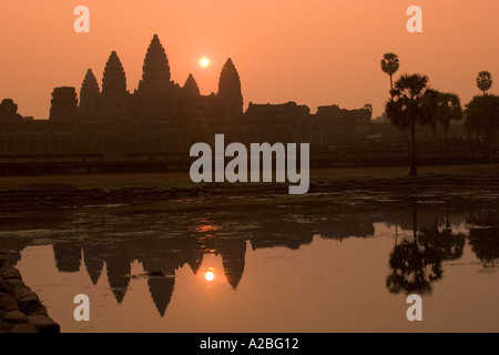 Cambodia Siem Reap Angkor Wat dawn sun rising over the central temple towers Stock Photo