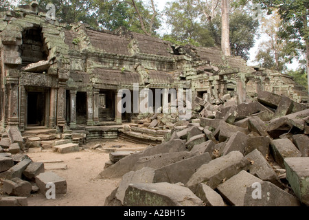 Cambodia Siem Reap Angkor Thom group Ta Prohm Buddhist Temple cloisters surrounding central sanctuary piles of blocks Stock Photo